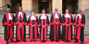 Lady Justice Martha Koome (center) and the other members of the Supreme Court bench.