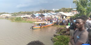 Residents Watch as Rescue Operation Continues to Rescue Those Who Drowned in Lake Victoria on Tuesday September 21