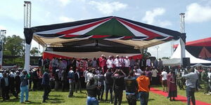 Leaders on stage at the William Ole Ntimama Stadium in Narok during a Building Bridges Initiative (BBI) meeting on Saturday, February 22