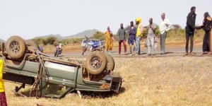 Locals gathered after an accident involving a KDF vehicle in Karare along Marsabit - Isiolo highway on Tuesday June 27, 2023