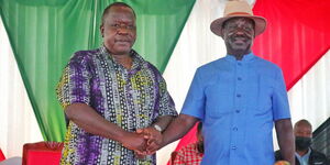 Former Interior CS Fred Matiang'i and ODM leader Raila Odinga at a fundraiser in Mwongori High School in Kisii County on October 22, 2021.