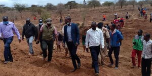 Mwingi West MP Charles Nguna inspecting the construction of Kaumoni dam, Katuyu village in Nguutani Ward in 27/8/2020.