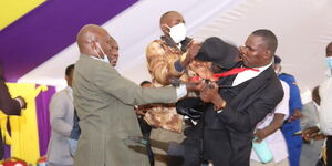 MPs Simba Arati (left) and Sylvanus Osoro clash at the funeral