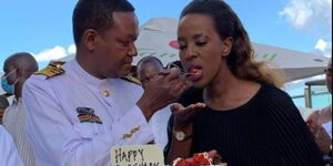 Machakos Governor Alfred Mutua offers former Wife Lilian Ng'ang'a a piece of cake during his birthday Party.