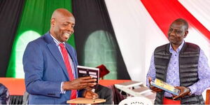 Ezekiel Machogu and President William Ruto at an event on September 5, 2022.
