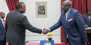 A file photo of Former President Uhuru Kenyatta and Former Education Cabinet Secretary Prof George Omore Magoha