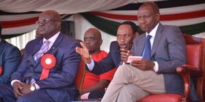 A file photo of the late former Education CS George Magoha(left), Music Copyright Society of Kenya CEO Ezekiel Mutua(middle) and President William Ruto(Right)