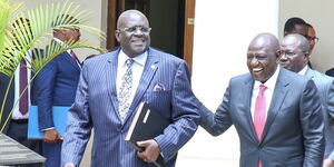 President William Ruto and former Education CS George Magoha sharing a light moment at State House on September 27, 2022.