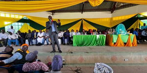 Former Senator Cleophas Malala addressing Kakamega residents during the thanksgiving ceremony of Commissioner Hadija Nganyi, Commission on Revenue Allocation on January 15, 2023. 
