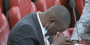 Kakamega  Senator Cleophas Malala wipes off tears in the Senate on September 14, 2020.