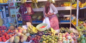 A local woman selling fruits and vegetables in Nairobi in November 2017
