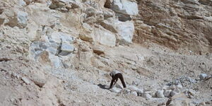 An undated image of a man mining in a quarry in KMQ area, Kajiado West, Kajiado County