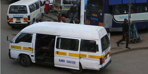 Matatus pictured at a terminus.