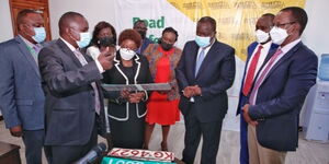 Interior and coordination of National Government CS Dr Fred Matiangi accompanied by CAS Hussein Dado, PS Karanja Kibicho, IG Hilary Mutyambai and the DG Financial Reporting Centre (FRC) Saitoti Maika in a meeting with NTSA top officials where they rolled out a new set of plates on Friday, January 28, 2022.