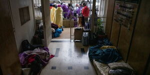 Kenyan migrant workers sleep outside Kenyan consulate in Badaro, Beirut on January 11, 2022