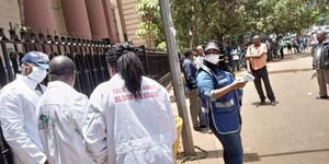 Medics conducting random screening for Covid-19 symptoms at National Archives, Nairobi on Saturday, March 21, 2020