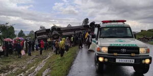 Medics from Londiani Hospital attend to victims of accident at Fort Ternan on Monday, October 11, 2021.