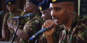 Members of the Maroon Commandos performing their latest song titled Corona.