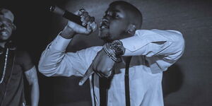 Michael Orengo takes the stage and performs a rap song on October 21, 2015.