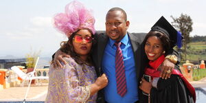 Nairobi Governor Mike Sonko (center), his wife Primrose Mbuvi (right) and daughter Saumu during her graduation in June 2018.