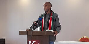 An Image of Milton Nyakundi addressing the press on Sunday, October 17 at Ngong Hills Hotel.