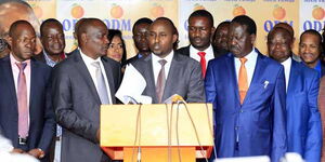 Minority Whip in the National Assembly Junet Mohammed (centre) ODM leader Rails Odinga (right) and the leader of the Minority in the National Assembly John Mbadi address the press at Orange House on March 18, 2018.