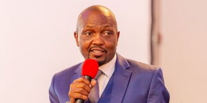 Trade CS Moses Kuria speaking to manufacturers at a hotel in Nairobi.