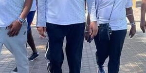 Moses Kuria walking with his friends and family in Dubai on February 12, 2022.