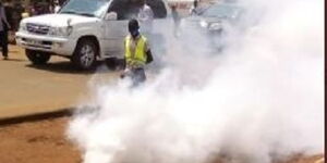 Bungoma Senator Moses Wetangula's vehicle drives past a teargas cannister on June 19, 2020.