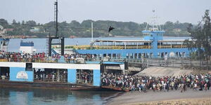 Motorists and pedestrians alight from MV Nyayo at the Likoni channel in Mombasa on January 15, 2019. 