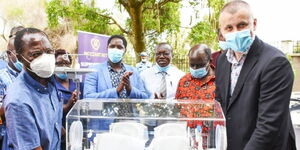 Kisumu Governor Anyang' Nyong'o with Mozzart Country Manager Sasa Krneta on Friday, March 5, 2021.