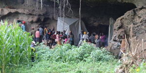 Mt Elgon families pictured in a cave within the forest canopy.