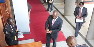 Elgeyo Marakwet Kipchumba Murkomen sanitizing his hands before entering the Senate on March 31, 2020.
