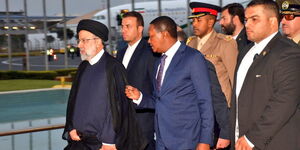 Foreign Affairs CS Alfred Mutua welcoming President Ebrahim Raisi of Iran and his delegation at JKIA on July 12, 2023.