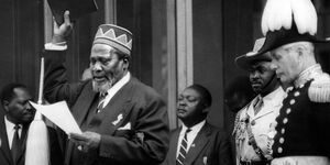 Mzee Jomo Kenyatta takes the oath of office during his swearing-in as Kenya's first Prime Minister on June 1, 1963 .jpg