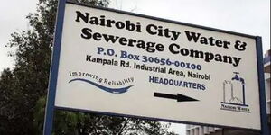 A signboard showing the directions to Nairobi City Water and Sewerage Company (NCWSC).