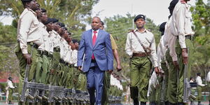 CS Kindiki checking guard of honour by National Governmment Administrative Officers 