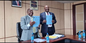 NPSC Chairman Eliud Kinuthia (left) and IG Hillary Mutyambai at his office.