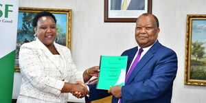 CS Labour Florence Bore and former NSSF Chairman Julius Karangi during handing over ceremony held at NSSF head office in Nairobi on January 3, 2023.