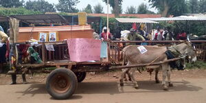 A casket on a donkey-drawn cart