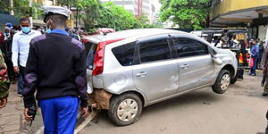 A breakdown tow away a car which was involved in an accident along Kimathi Street in Nairobi on October 26, 2020. 
