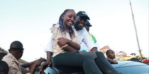 Nairobi Senator Johnson Sakaja and form 2 student Lyons Wanjiru at a rally