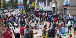 Nairobi residents pictured at Kenya National Archives section of Nairobi CBD