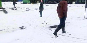 Narok residents walking in the snow.