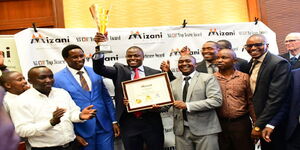 Kiharu MP poses with an award from Mizani Africa in Nairobi on February 25 after his constituency was ranked the best in CDF utilization