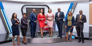 News anchors at KBC pose in the station's revamped studio.