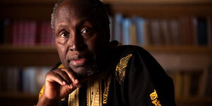 A photo of Ngugi wa Thiong'o in a library