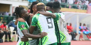 Nigeria players celebrate scoring a goal at an Afcon tourney 