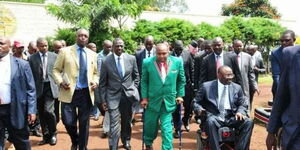 Nominated MP David Ole Sankok (in green suit) with DP William Ruto (on his right) and other dignitaries.