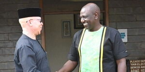 Former Nominated Senator Isaac Mwaura and President Willia Ruto at his Karen office on Monday, April 25, 2022..jpg